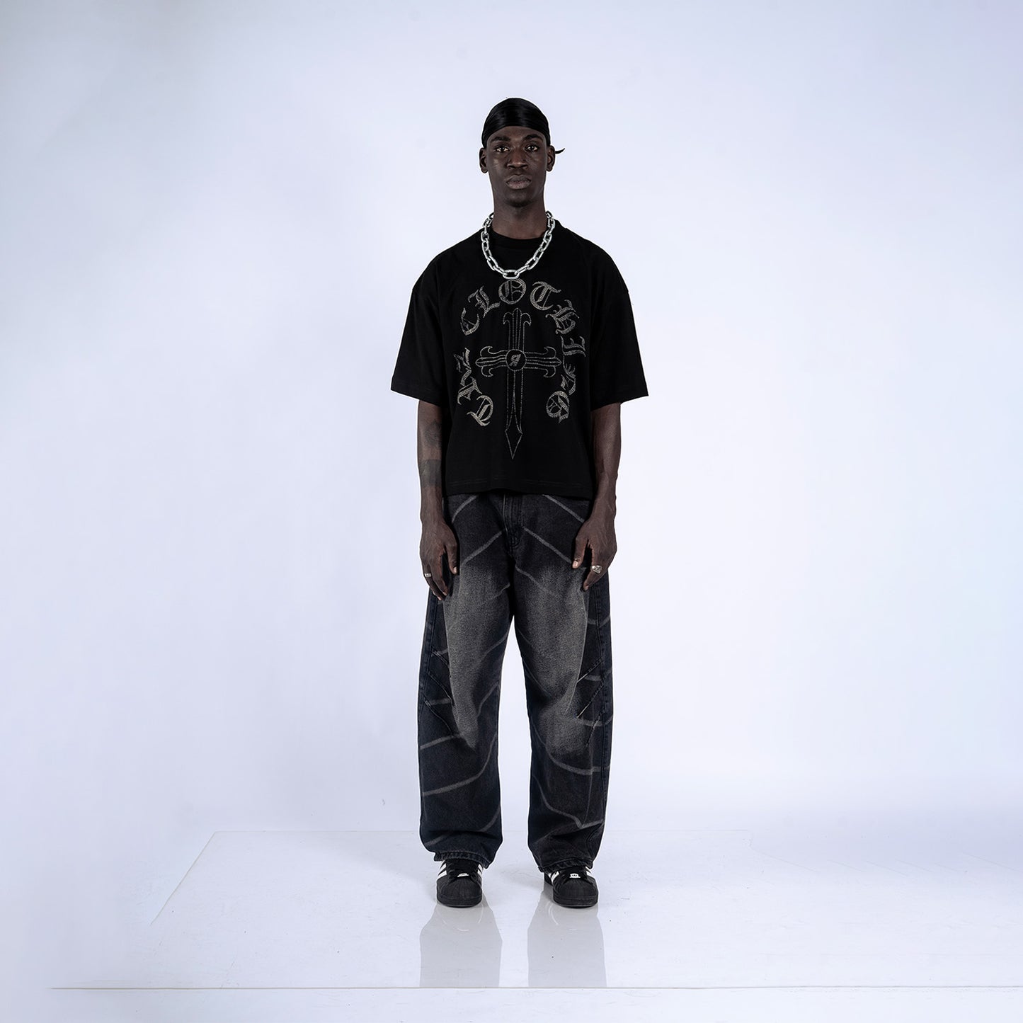 POLO BOXY FIT CORLE | NEGRO