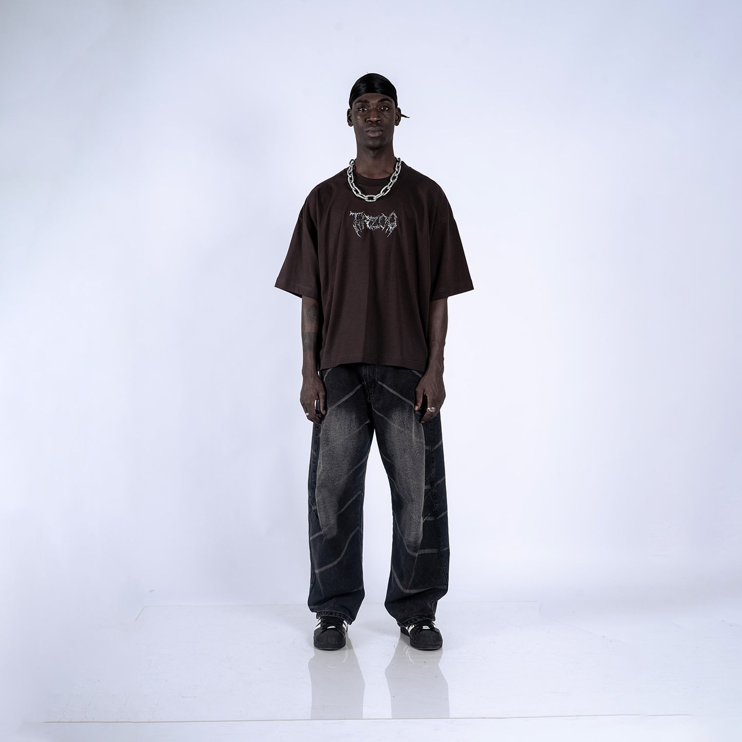 POLO BOXY FIT DEVIL | MARRÓN