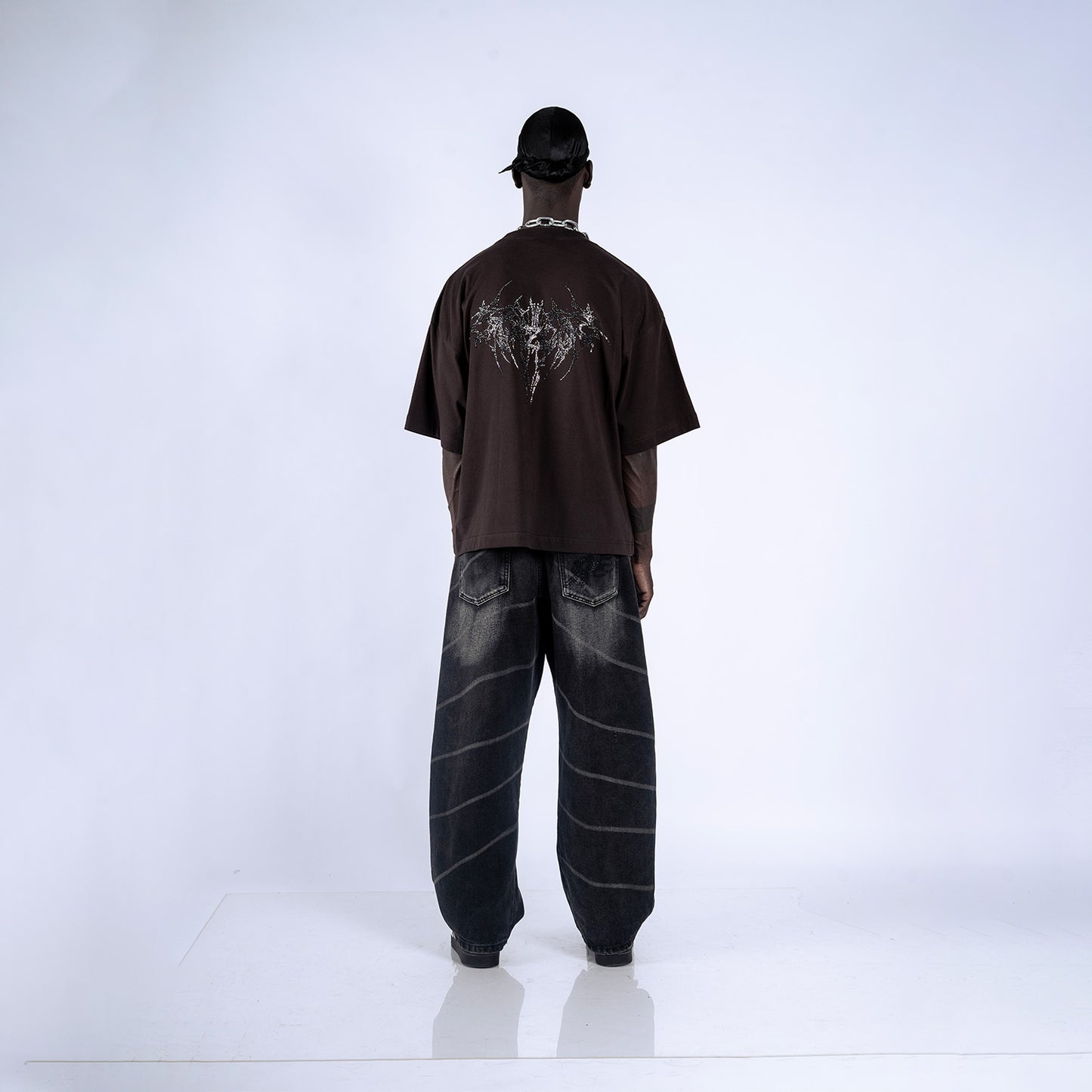 POLO BOXY FIT DEVIL | MARRÓN